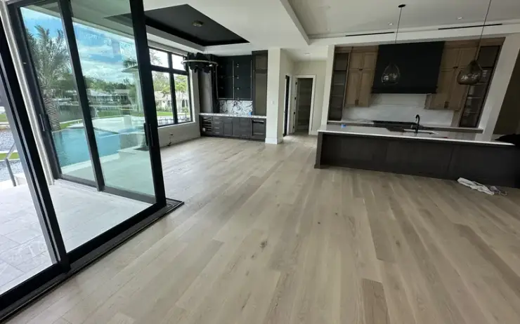 Custom herringbone hardwood flooring installation by Triangle Flooring