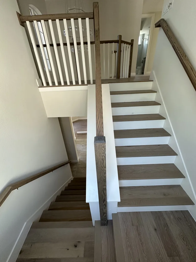 White Oak stair treads custom installation in Venice FL home