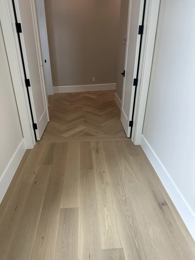White Oak stair treads with herringbone landing pattern
