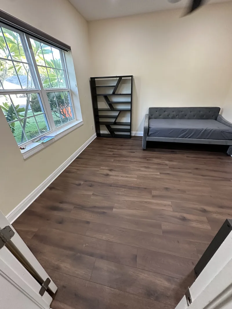 Gray luxury vinyl plank flooring in Tampa FL condo